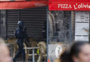 Funcionários reféns em pizzaria em Paris foram libertados; homem detido